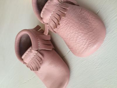 Customer photo for "Poor leather quality, not made in USA"
