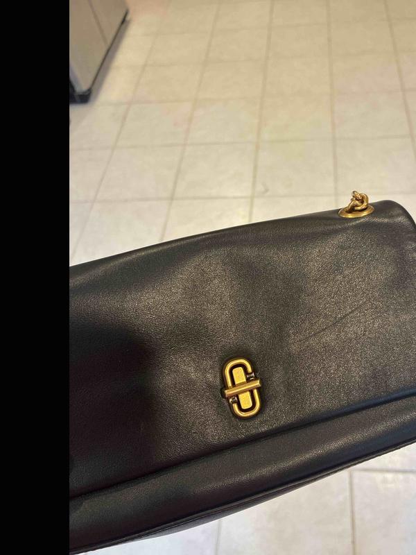Customer photo for "arrived scratched and used"