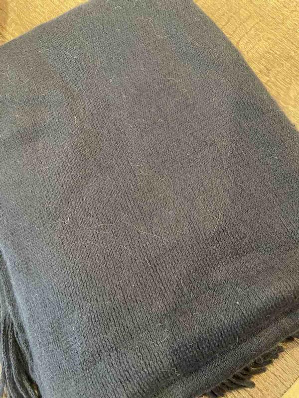 Customer photo for "blanket came obviously used and returned"