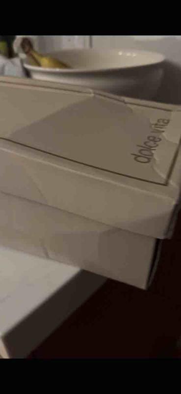 Customer photo for "shoes ok but beat up box"
