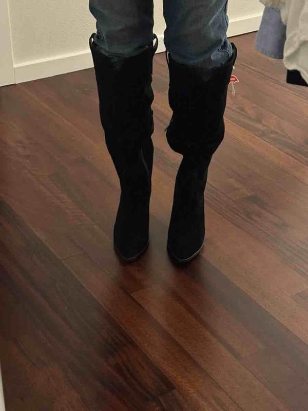 Customer photo for "boot calf area is inconsistent and large"