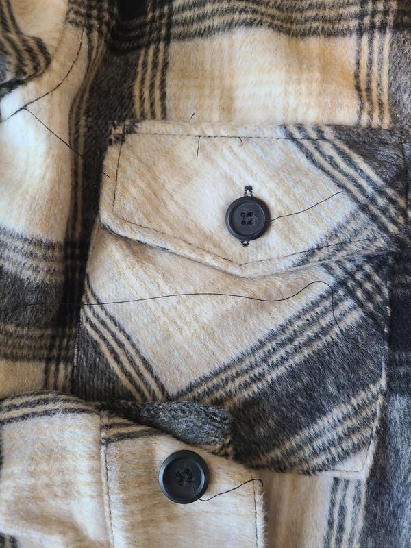 Soft and warm but lots loose threads