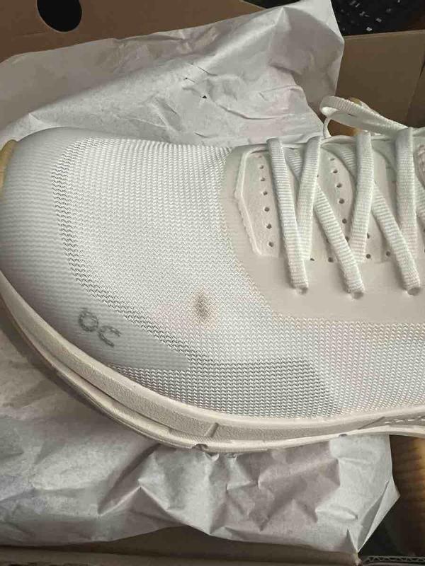 Customer photo for "shoes arrived dirty"