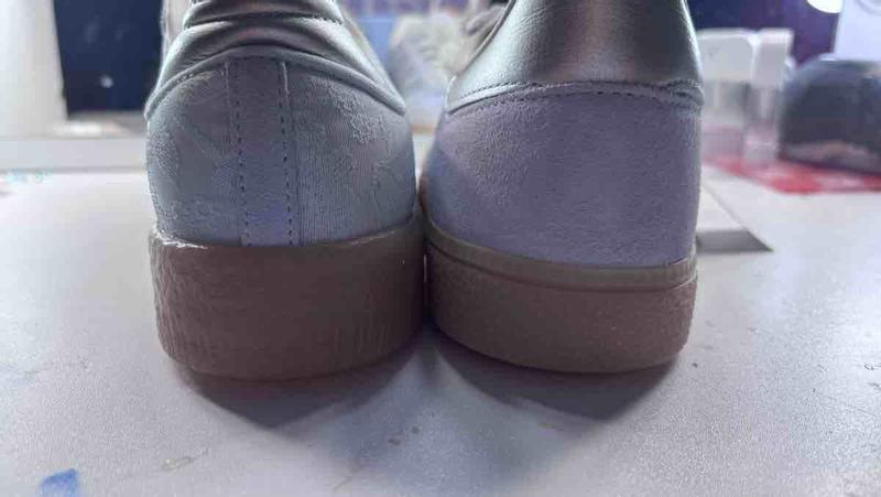 Customer photo for "Recieved 2 Different Shoes"