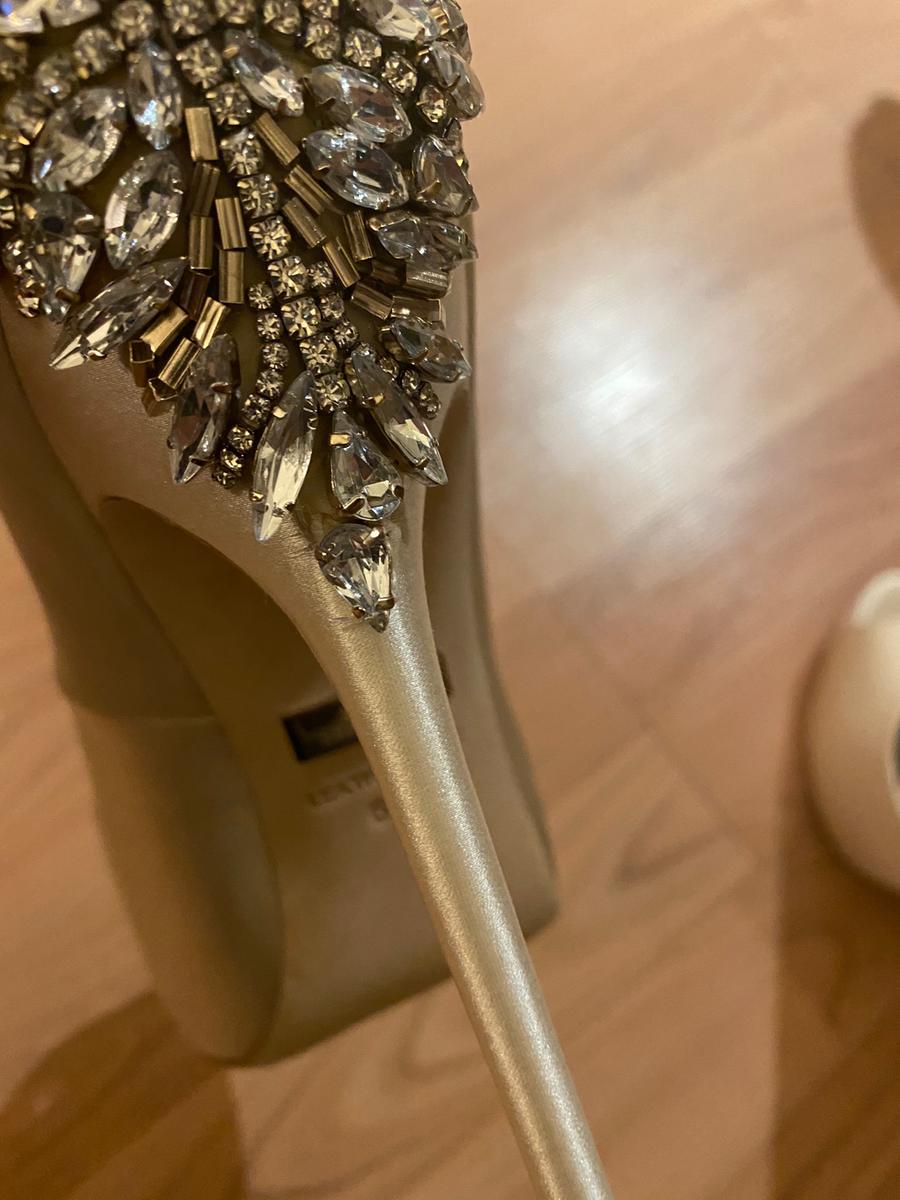 Gorgeous shoes, but the heels are too high.