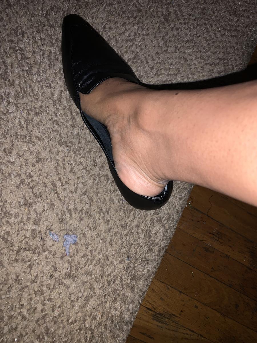 Customer photo for "Long shipping. Great Shoe. Fits slightly large"