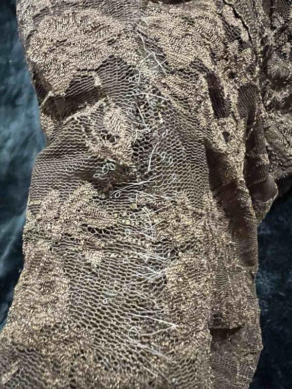 Customer photo for "Beautiful top but elastic frays quickly"