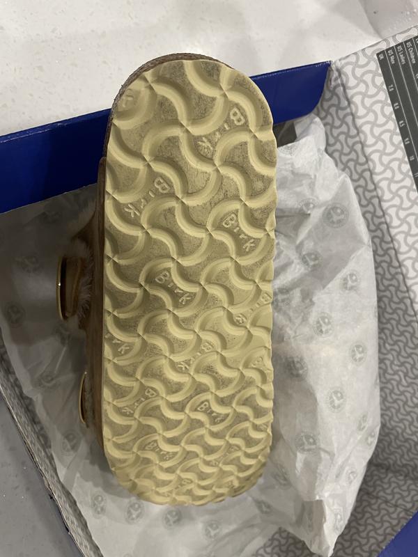 Customer photo for "Was sent dirty used shoes"