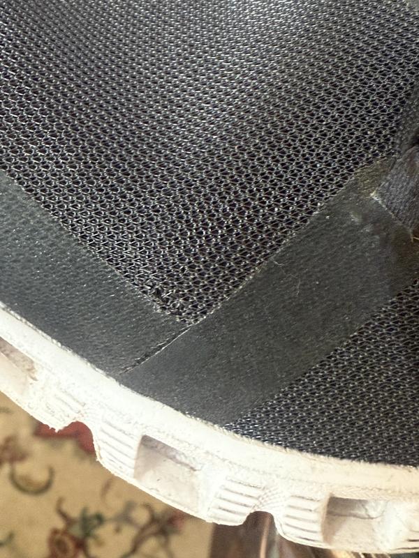Customer photo for "A hole created on the corner of the shoes"