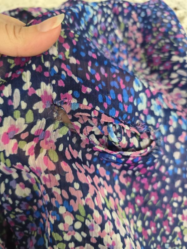Customer photo for "Poor quality, pocket ripped out after 2nd wash"