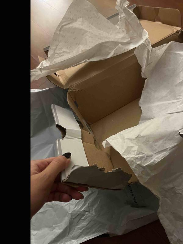 Customer photo for "recieved damaged shoes"