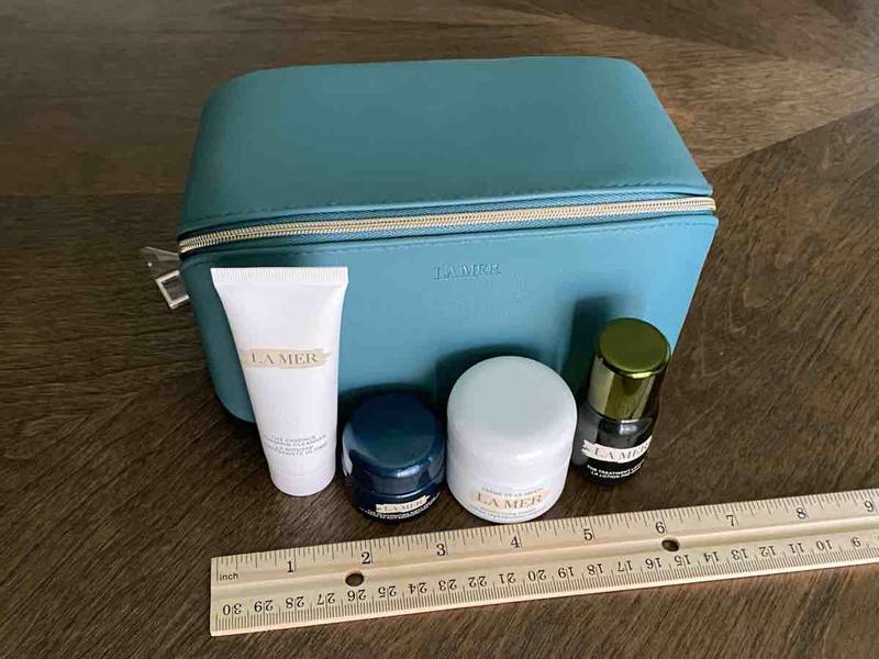 Customer photo for "lovely travel bag and generous minis!"