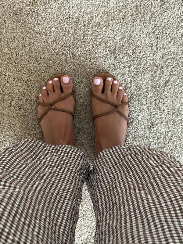 Customer photo for "Exposed Seam on left sandal"