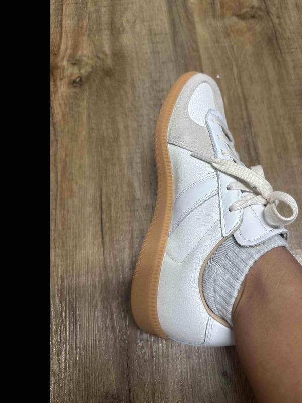 Customer photo for "minimalist white sneakers"