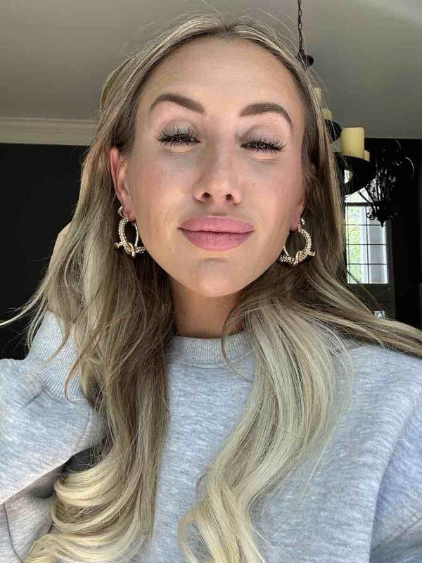 Customer photo for "unique stunning hoops"