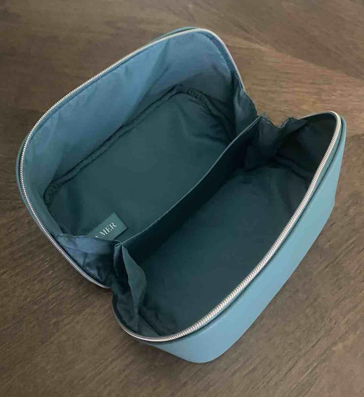 Customer photo for "lovely travel bag and generous minis!"