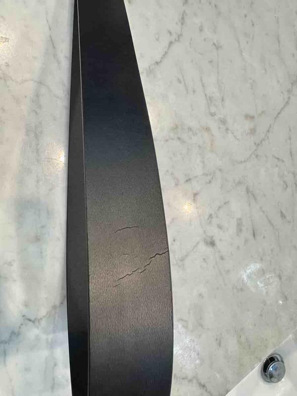 Customer photo for "low quality leather"