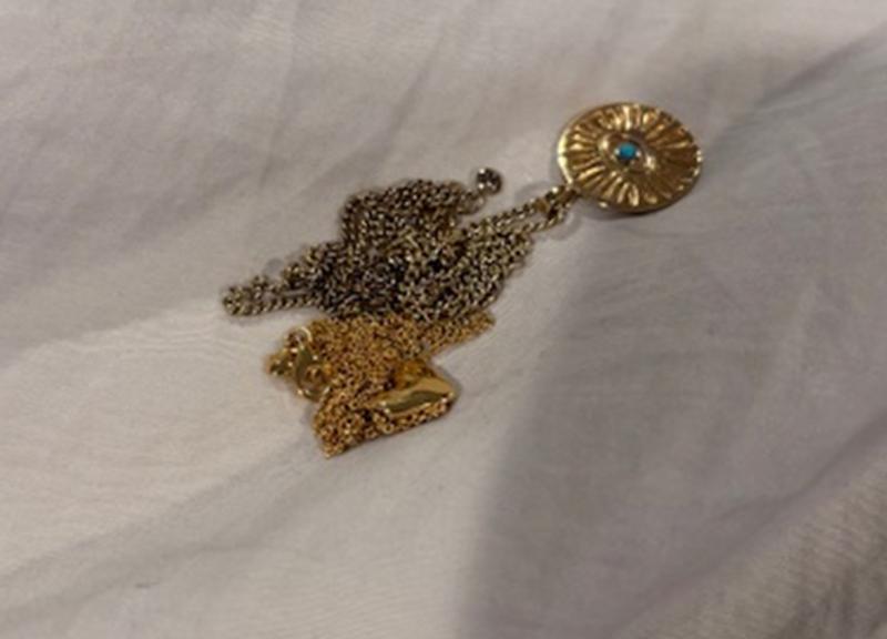 Customer photo for "Not natural gold color and tarnishes easily"