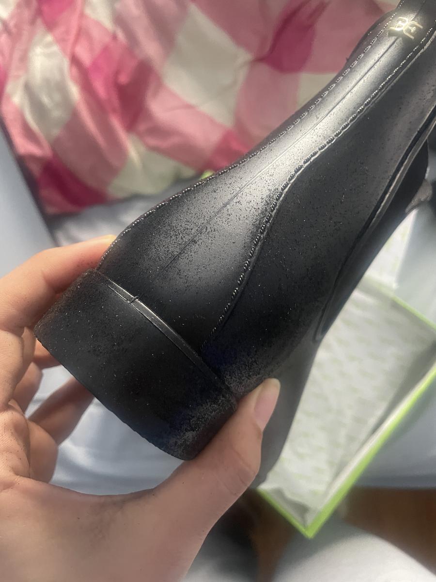 Customer photo for "Black powder on outside and inside of boots"