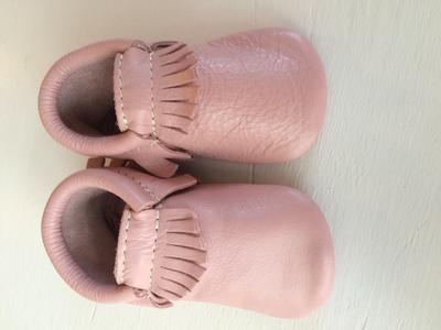 Customer photo for "Poor leather quality, not made in USA"