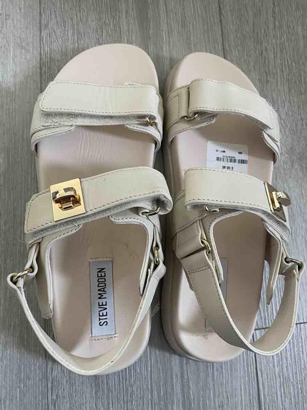 Customer photo for "Nordstrom sends used shoes"