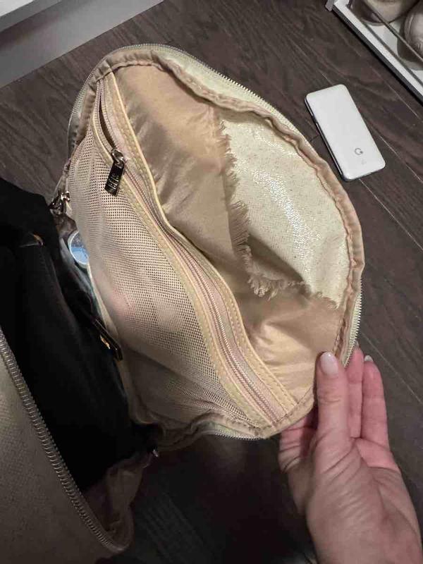 Customer photo for "interior lining fabric rips easily"