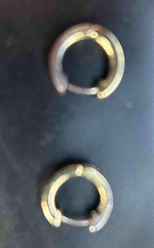 Customer photo for "perfect size huggie earrings"