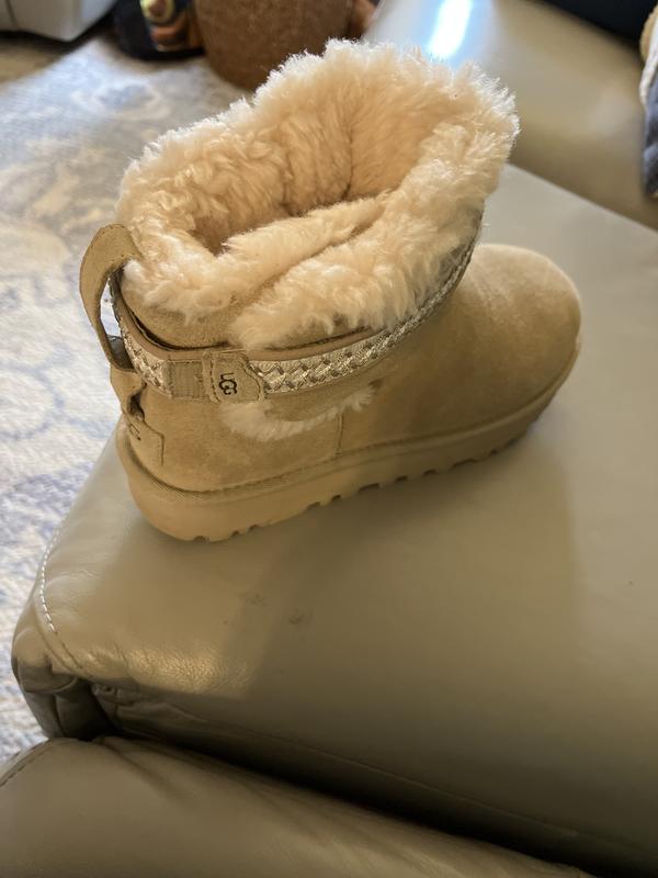 Customer photo for "Most comfortable UGG boot. Easy slide on true size"