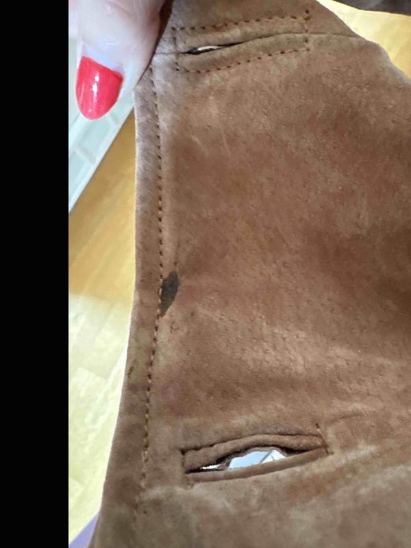 Customer photo for "weird stains on jacket"