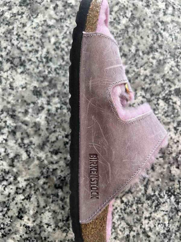 Customer photo for "areived extremely scratched and scuffed."