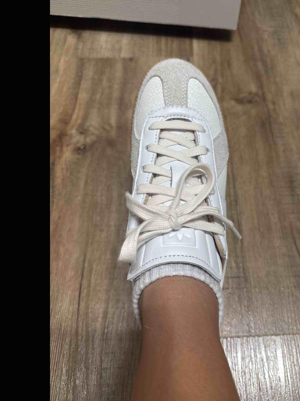 Customer photo for "minimalist white sneakers"