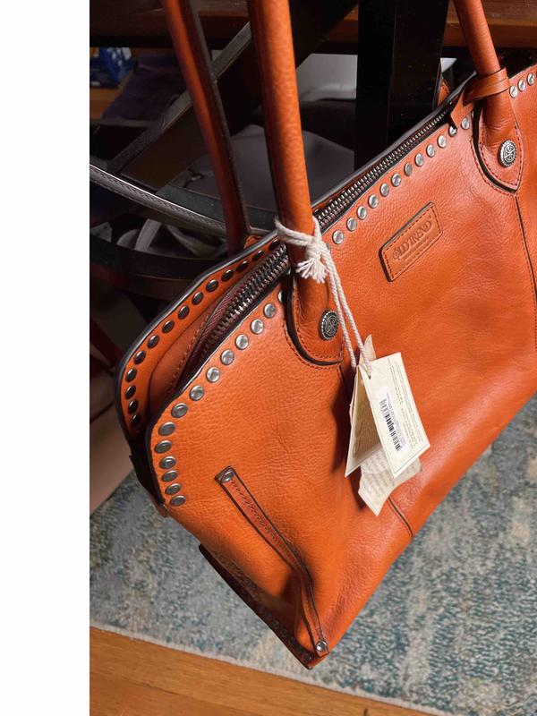 Customer photo for "the actual color is bright orange"