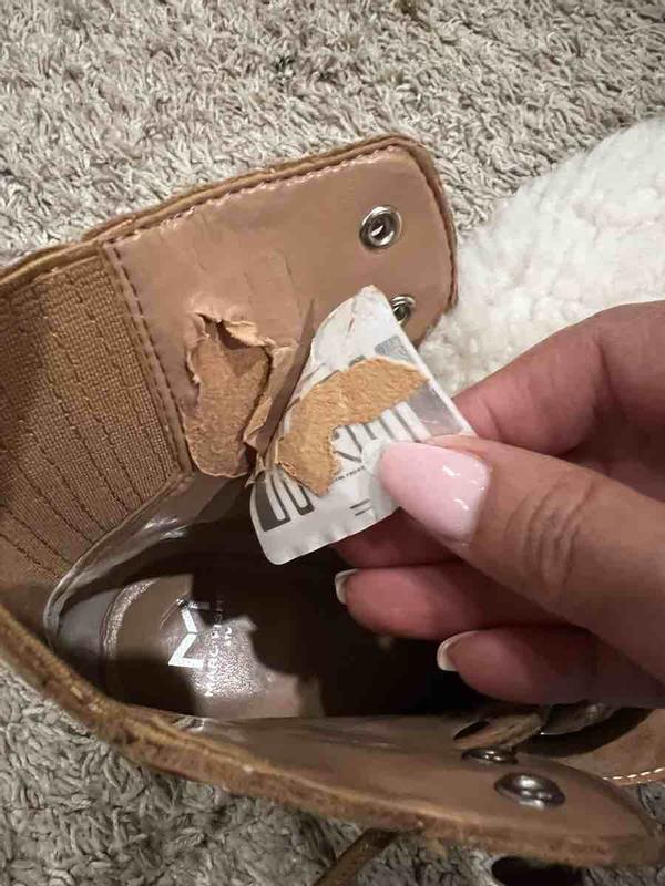 Love the boot but tag placing ruined it!