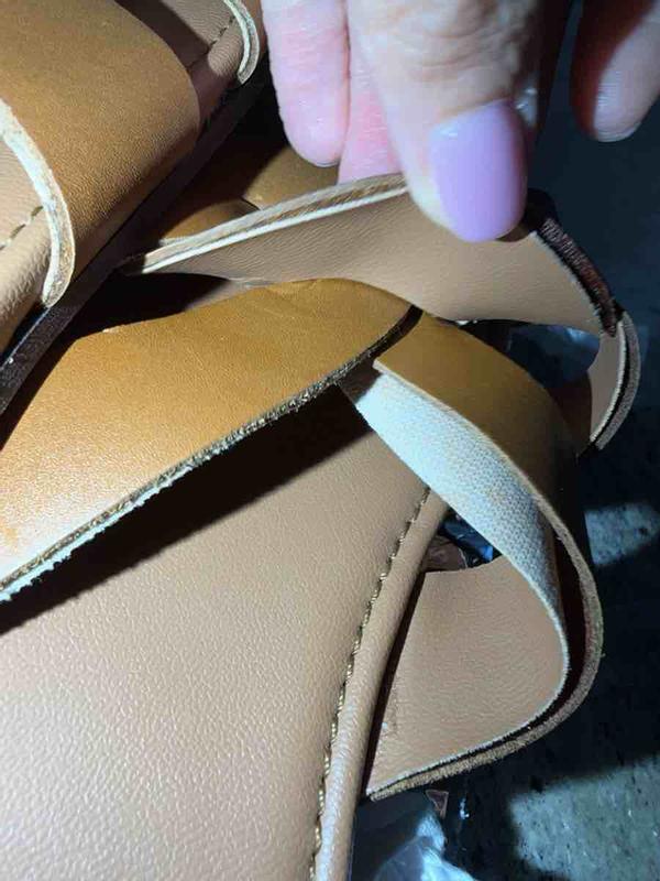 Customer photo for "shoes are peeling and in plastic grocery bag"