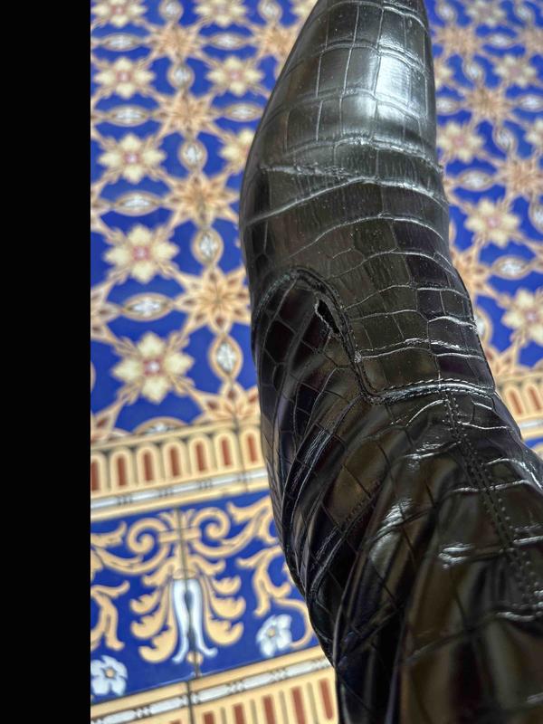 not leather and it has peeled and cracked