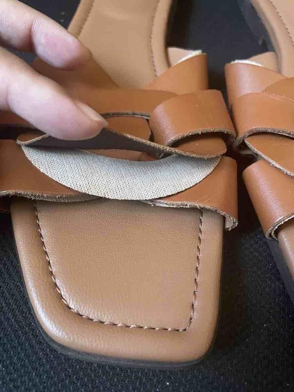 Customer photo for "Leather has separated and sizing is incorrect"