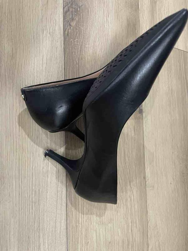 Customer photo for "Low quality Heels"