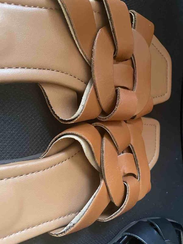 Customer photo for "Leather has separated and sizing is incorrect"