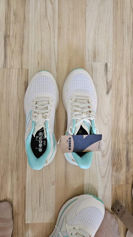 Customer photo for "Wide feet size up 1/2.."