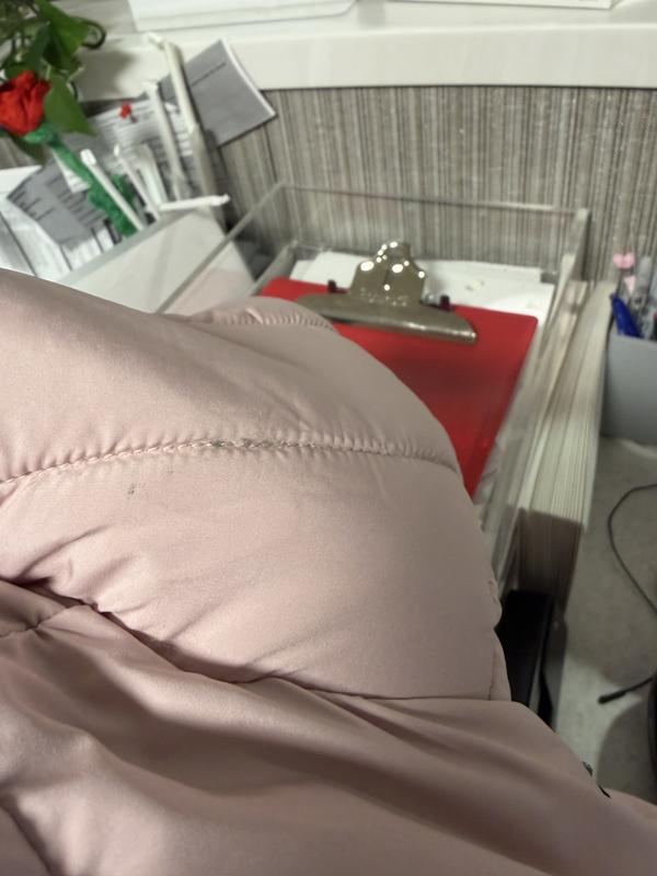 Customer photo for "store alarm attached to coat"