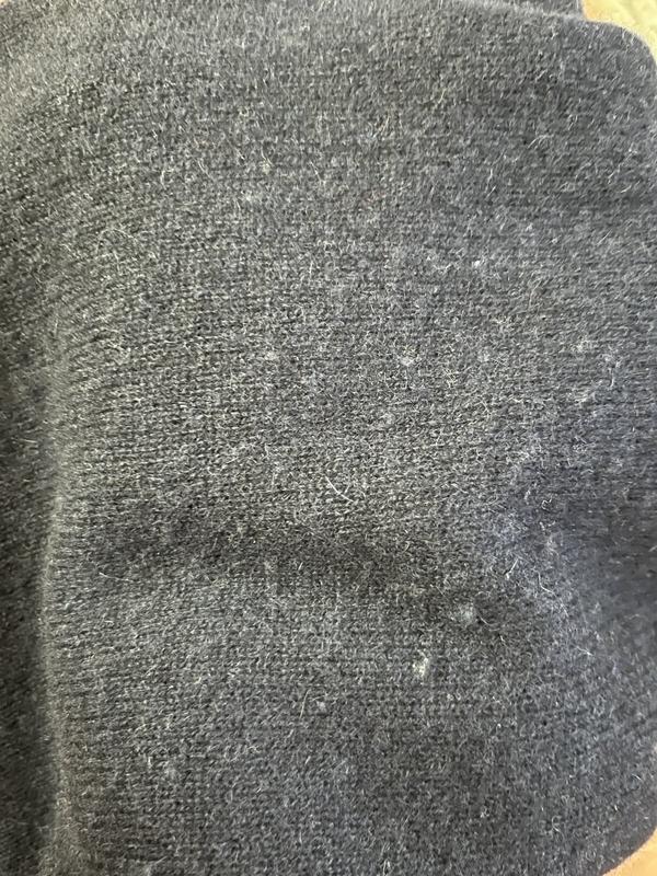 Customer photo for "shipped preworn defective, charges return fee"