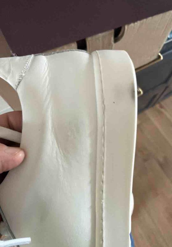 Customer photo for "worn and creased"