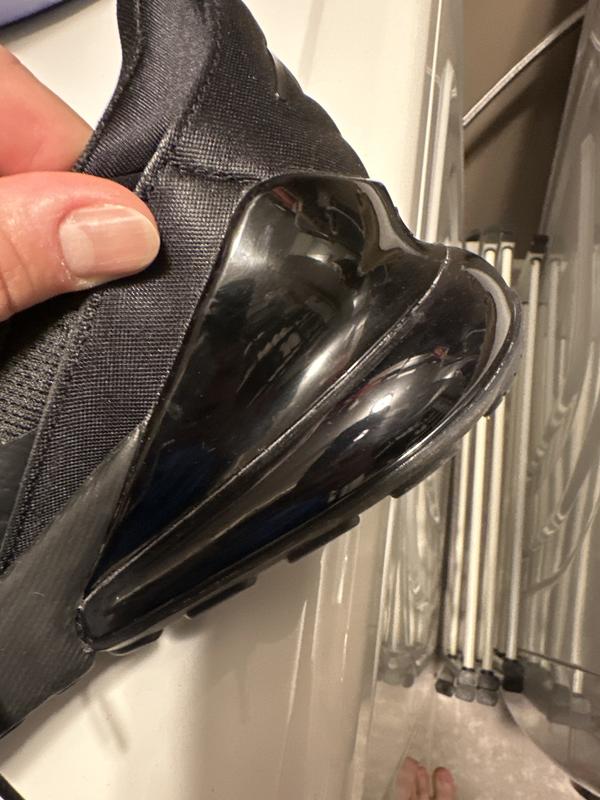 You see the glue smudged all around the shoe