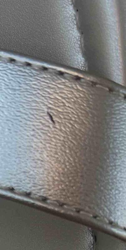 Detached heel. Scratched