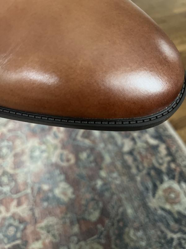 Not a sole make of “leather and manmade material”