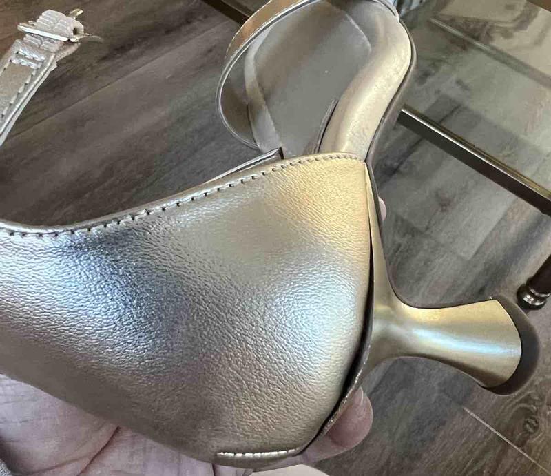 Customer photo for "Detached heel. Scratched"