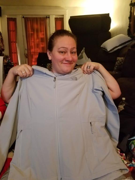 wife with her jacket on Christmas
