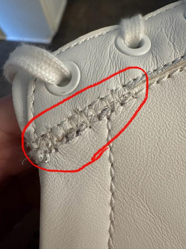 Leather torn. Tried to sew back together.