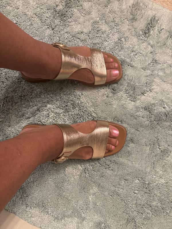 Customer photo for "Beautiful Sandals, Poor Construction"