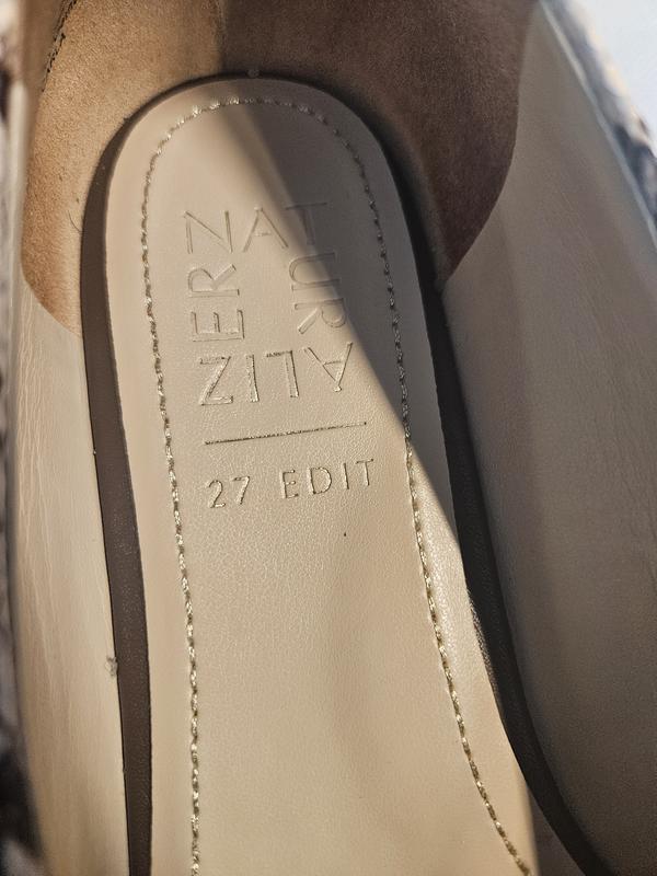 Customer photo for "Not a comfortable fit and peeling"